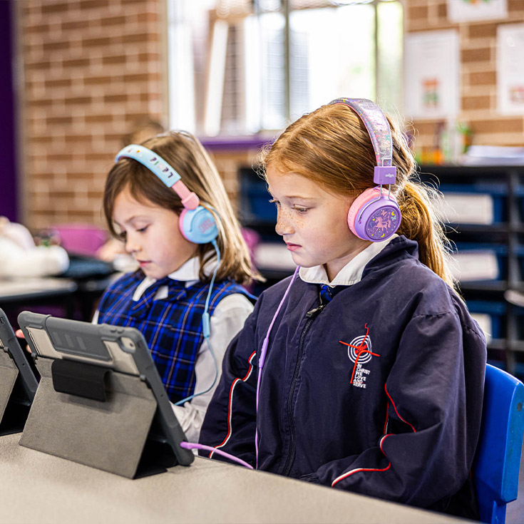 Students using technology at Bethany Catholic Primary School Glenmore Park