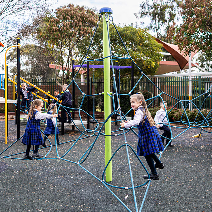 Student playing on the playground at Bethany Catholic Primary School Glenmore Park