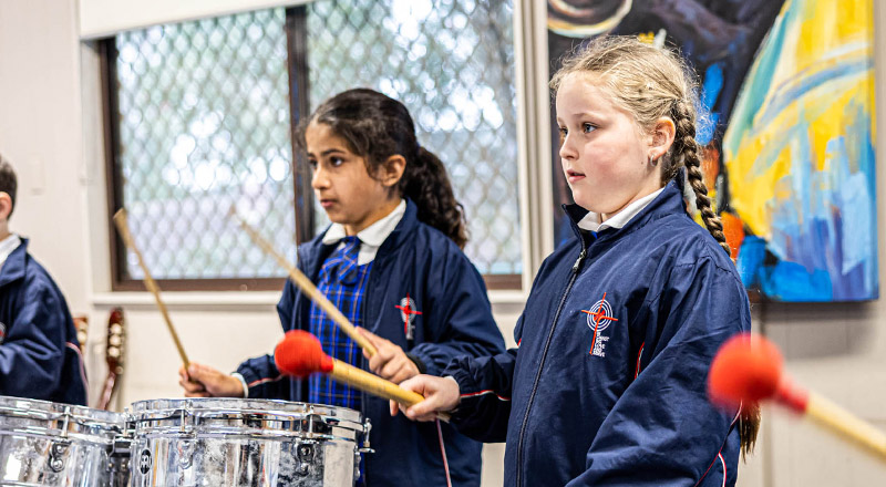 Bethany Catholic Primary Glenmore Park students learning drums
