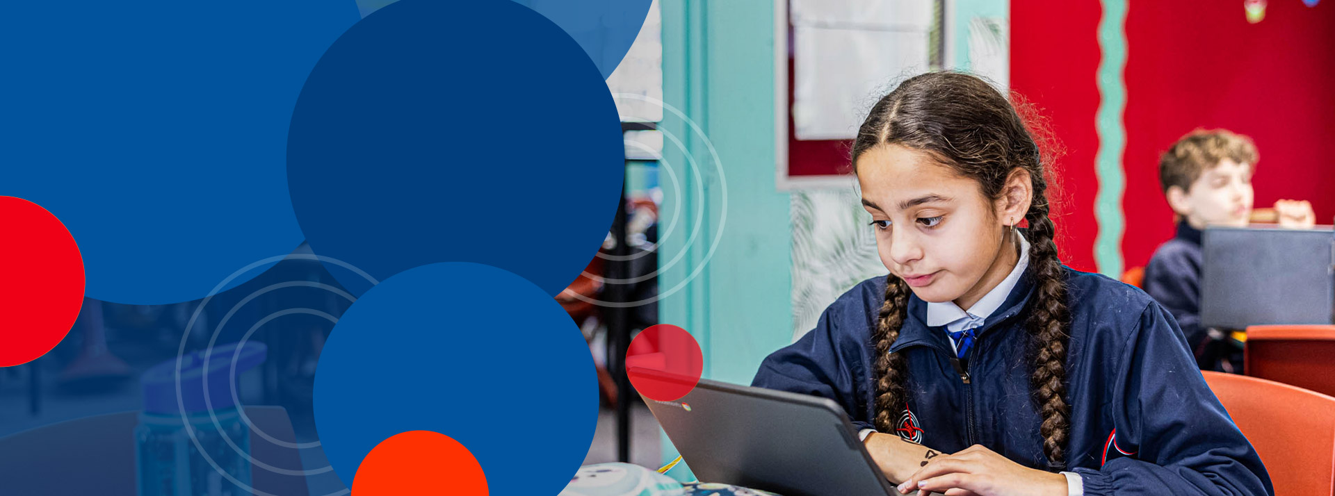 Student using laptop in the classroom at Bethany Catholic Primary School Glenmore Park