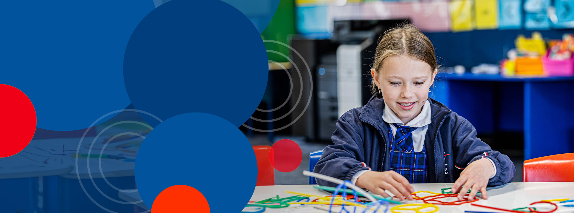 Student playing with pipe cleaners at Bethany Catholic Primary School Glenmore Park