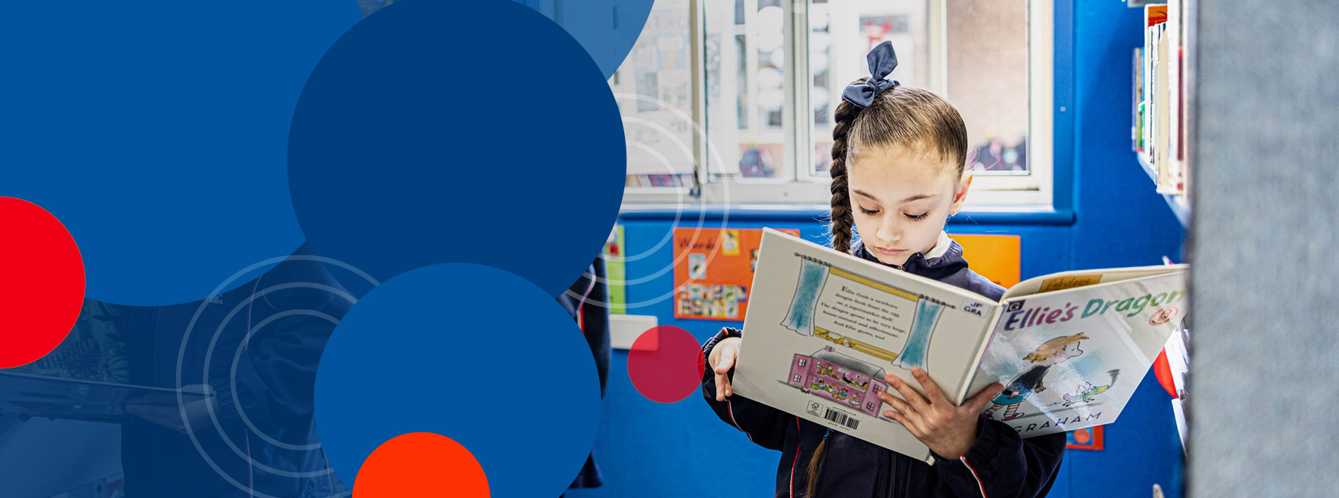 Student reading in the library at Bethany Catholic Primary School Glenmore Park