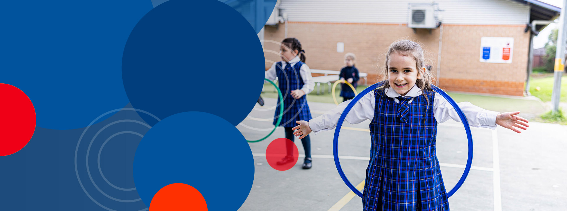 Student playing with hula hoop at Bethany Catholic Primary School Glenmore Park