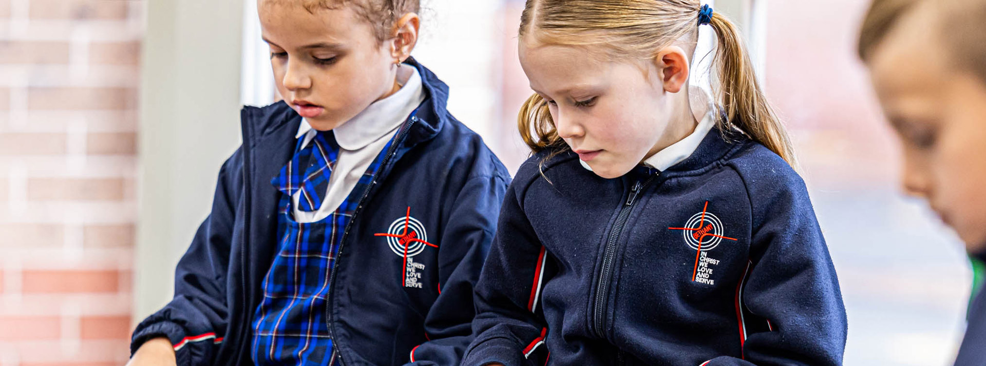 Students wearing their winter uniform at Bethany Catholic Primary School Glenmore Park