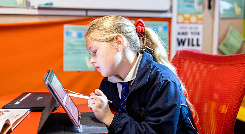 Student using learning tablet at Bethany Catholic Primary School Glenmore Park