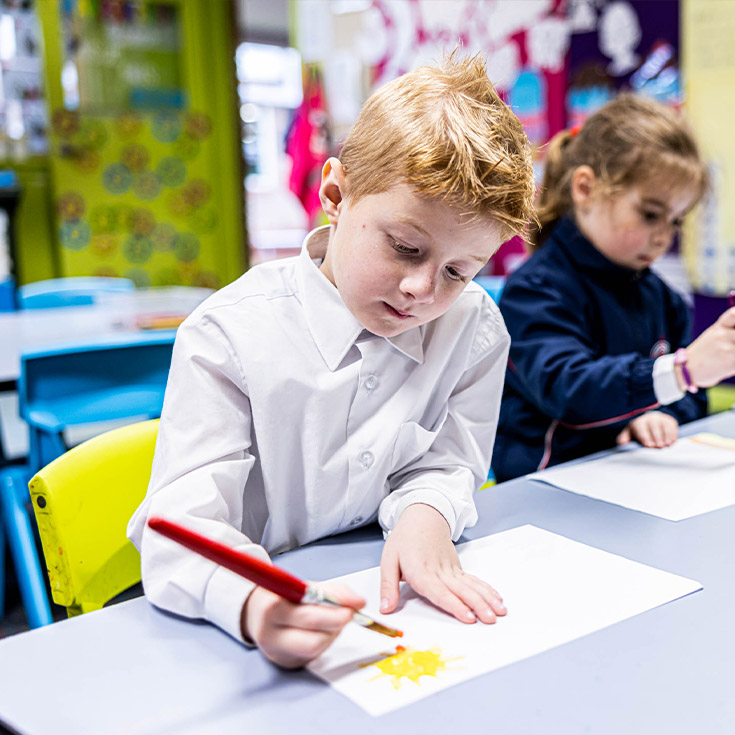 Student painting at Bethany Catholic Primary School Glenmore Park
