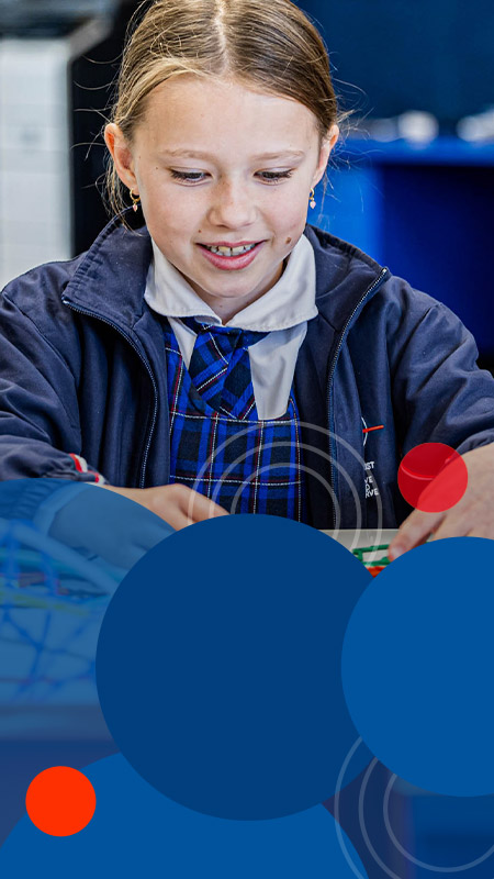 Student playing with pipe cleaners at Bethany Catholic Primary School Glenmore Park