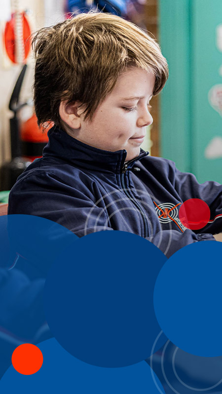 Students using technology at Bethany Catholic Primary School Glenmore Park