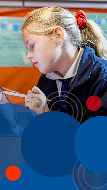 Bethany Catholic Primary School Glenmore Park student using learning device (iPad)