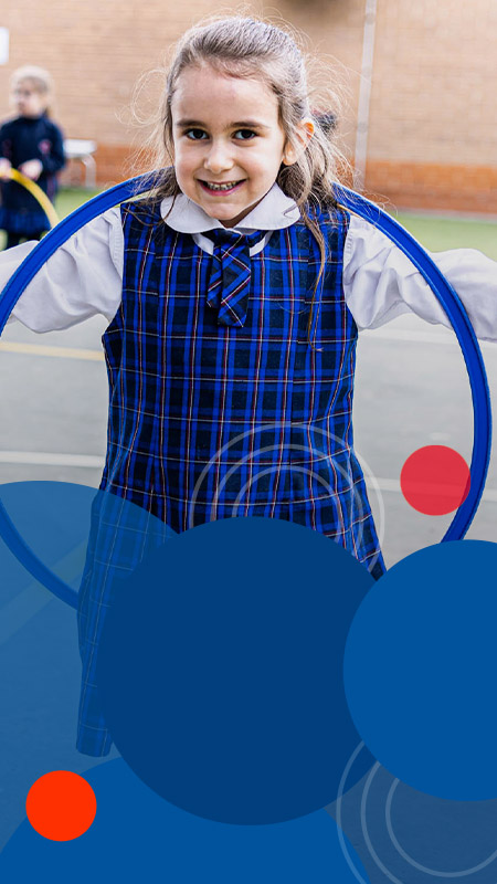 Student playing with hula hoop at Bethany Catholic Primary School Glenmore Park