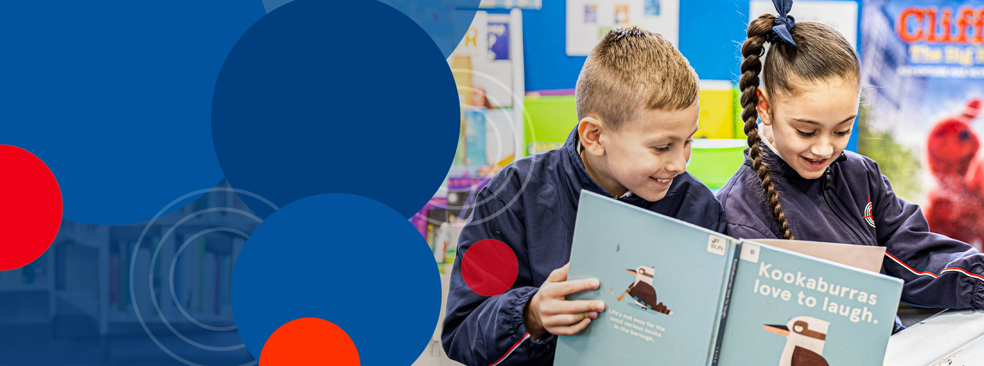 Students reading a book together at Bethany Catholic Primary School Glenmore Park