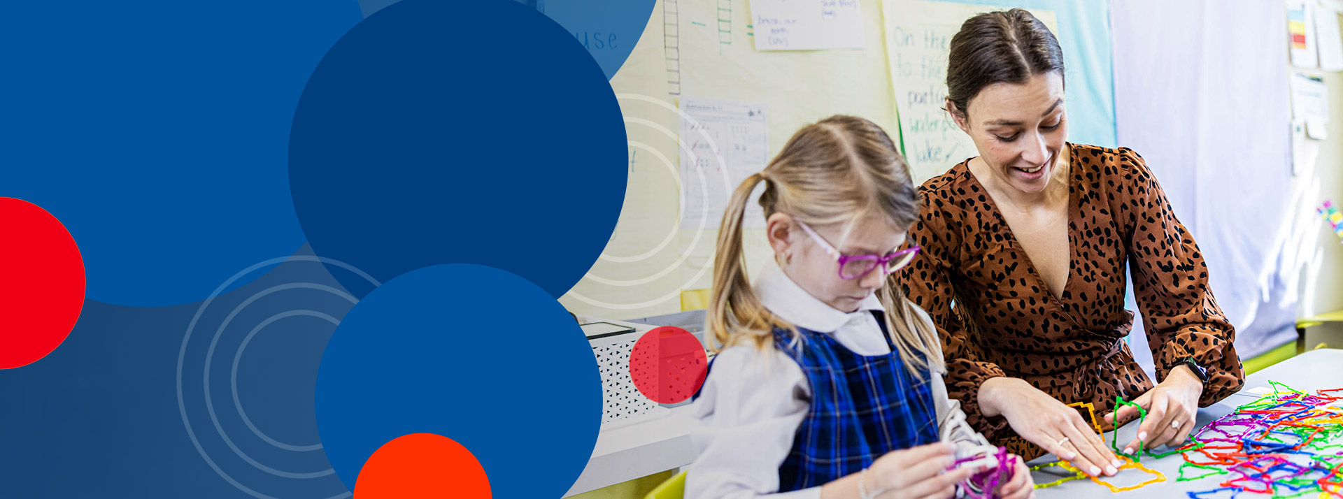 Teacher supporting student at Bethany Catholic Primary School Glenmore Park